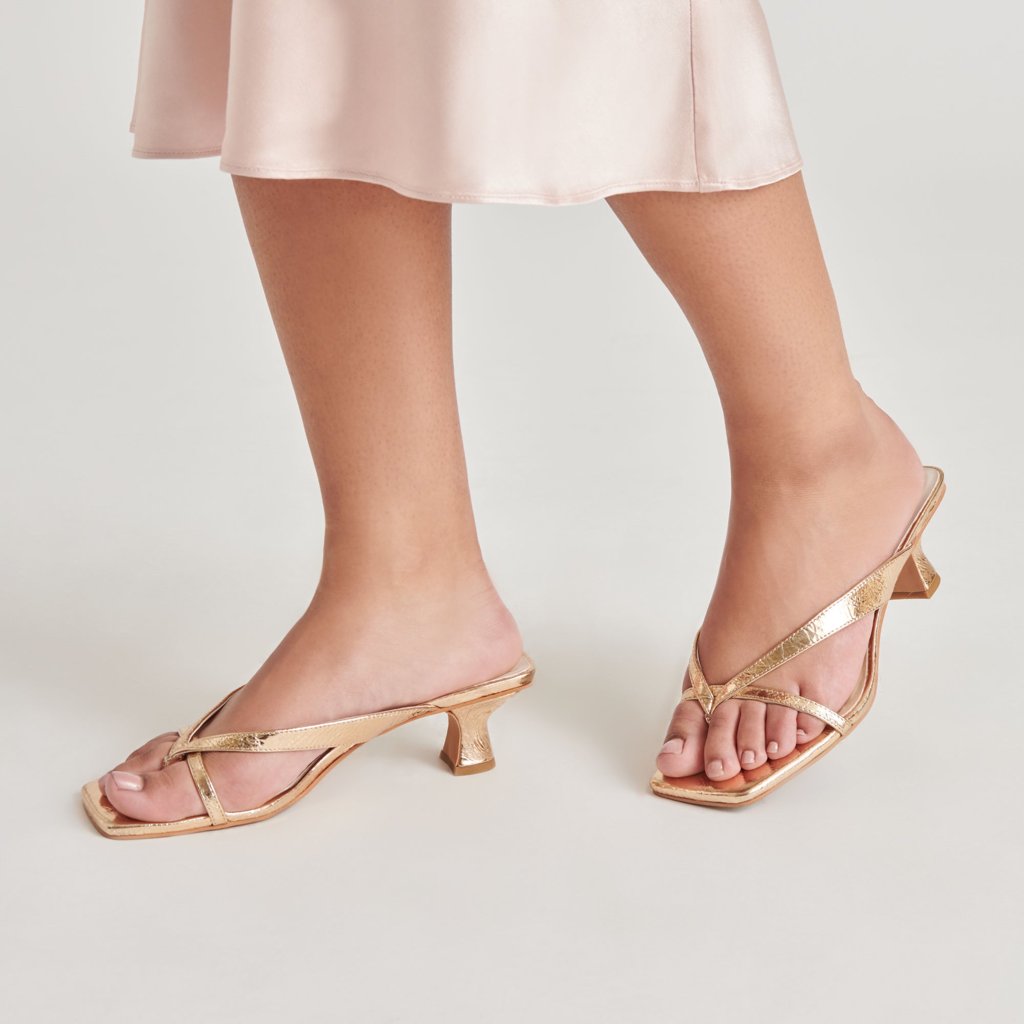 DOLCEVITA-HEELS_BREVEL_GOLDDISTRESSEDLEATHER-ONFOOT_02.jpg